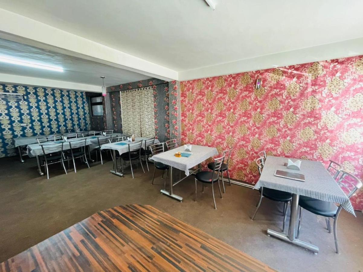 Hotel Devlok Inn مايالي المظهر الخارجي الصورة